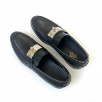 hermès-hot-loafer-black-calfskin-leather-with-kelly-buckle-hardware